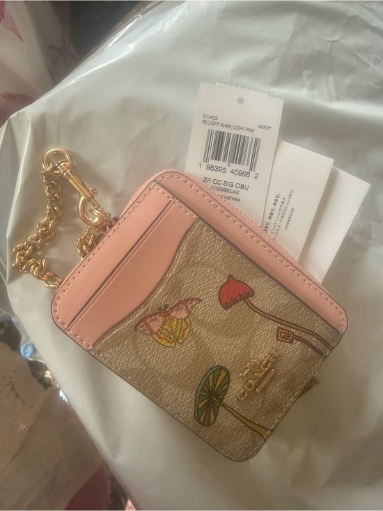 Coach Handbags - Coach Pink Trim Floral Printed Card Case with Gold Chain